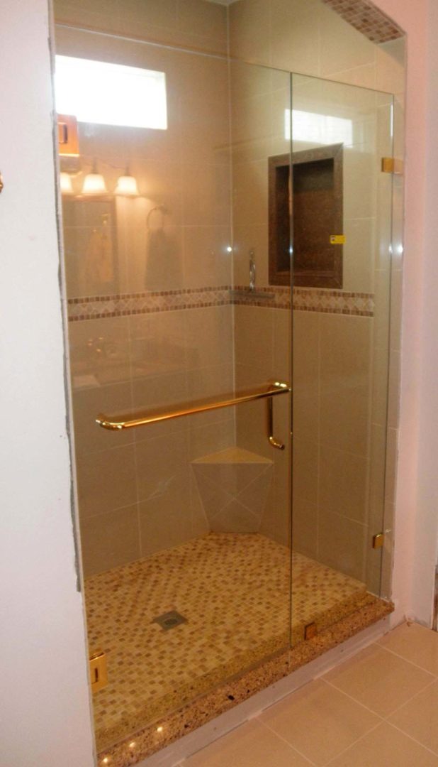 custom glass door and panel shower enclosure with clamps