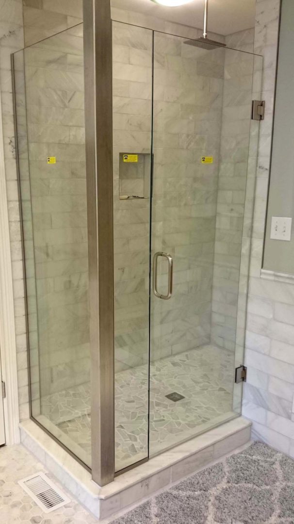 custom glass 90 degree shower enclosure with u channel